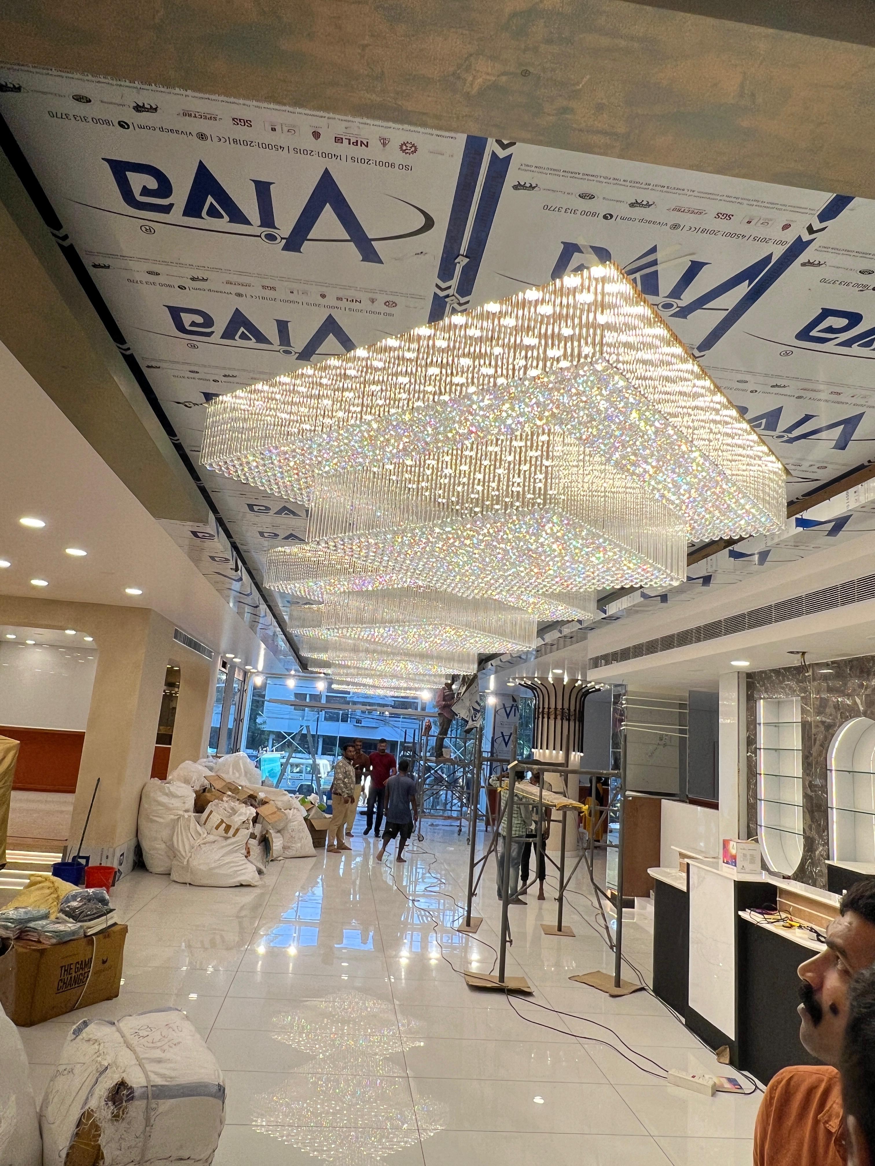 RK Wedding Mall luxury interior and chandelier project in Kollam, Kerala by Star Group Interiors